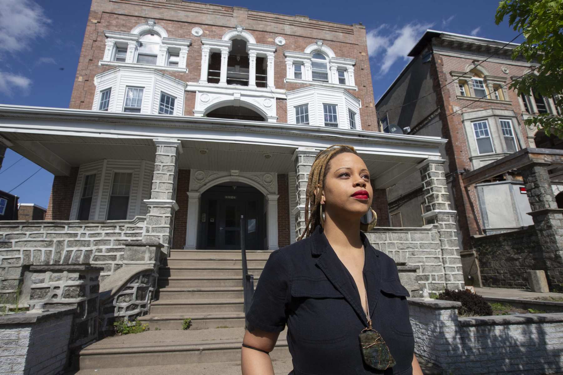 Shani Akilah of The Black and Brown Workers’ Collective organized her fellow tenants to ensure that their landlord did not kick them or their neighbors out of their six-unit apartment building in southwest Philadelphia. She is shown in front of the building on April 15, 2020.