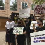 Dawn Wooten, left, a nurse at Irwin County Detention Center in Ocilla, Georgia, speaks at a Tuesday, Sept. 15, 2020 news conference in Atlanta protesting conditions at the immigration jail. Wooten says authorities denied COVID-19 tests to immigrants, performed questionable hysterectomies and shredded records in a complaint filed to the inspector general of the U.S. Department of Homeland Security. (AP Photo/Jeff Amy)