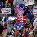 Supporters of President Donald Trump cheer as he speaks at a campaign rally, Tuesday, Sept. 22, 2020, in Moon Township, Pennsylvania.