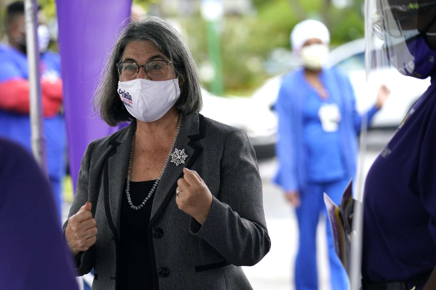 Miami-Dade County Commissioner Daniella Levine Cava meets with members of the SEIU Healthcare Florida Local 1991 during a "SEIU Votes" campaign event in October 2020, in Miami.