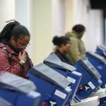 Voters cast their ballots at the polling place in downtown Chicago, Illinois on April 2, 2019. - Chicago residents went to the polls in a runoff election Tuesday to elect the US city's first black female mayor in a historic vote centered on issues of economic equality, race and gun violence. Lightfoot and Toni Preckwinkle, both African-American women, are competing for the top elected post in the city. (Photo by Kamil Krzaczynski / AFP) (Photo credit should read KAMIL KRZACZYNSKI/AFP via Getty Images)