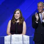 Sarah McBride speaks at a podium.