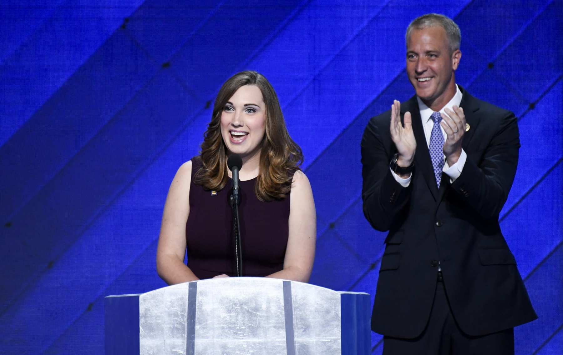 Sarah McBride speaks at a podium.