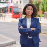 Lina Hidalgo stands on a street in Houston.