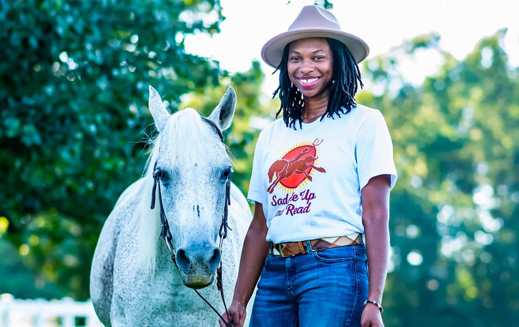 Caitlin Gooch poses with her horse, Goat.