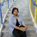 Shirley Sherrod sitting on steps.