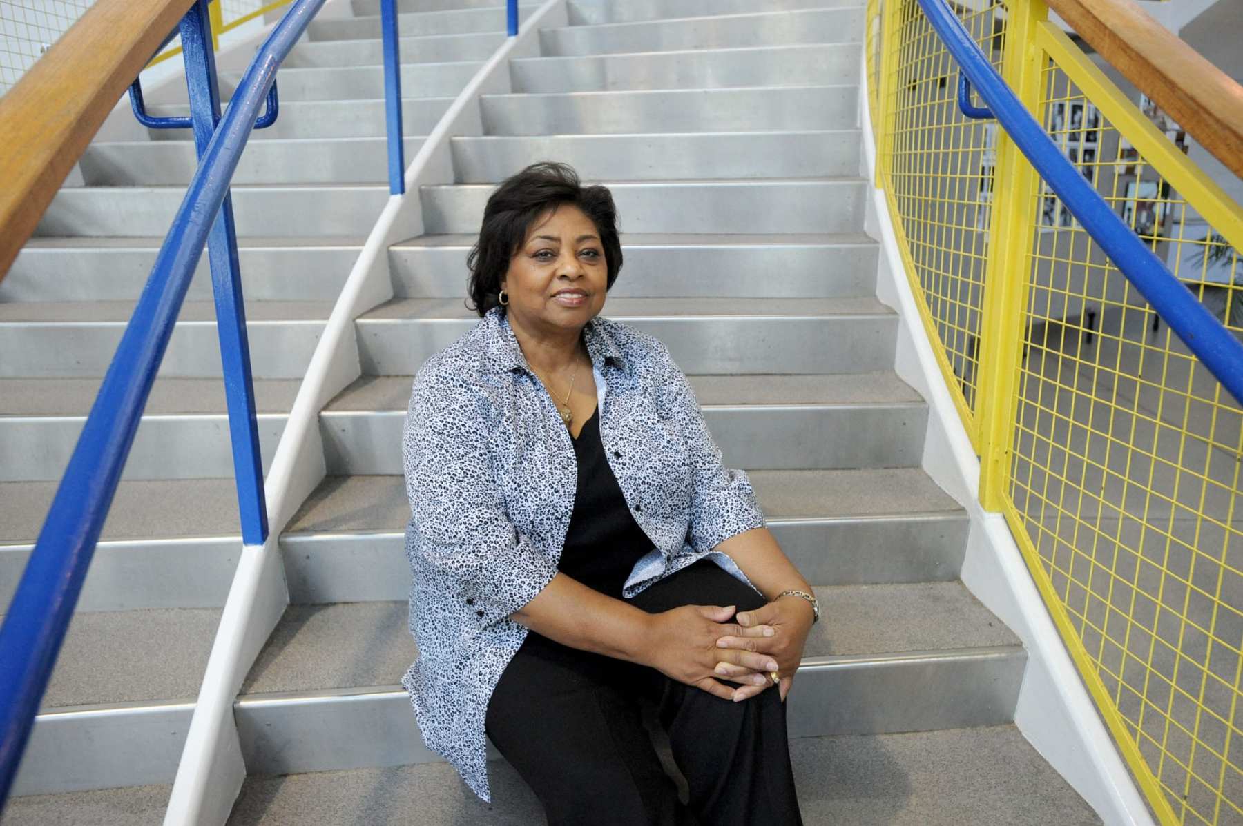 Shirley Sherrod sitting on steps.