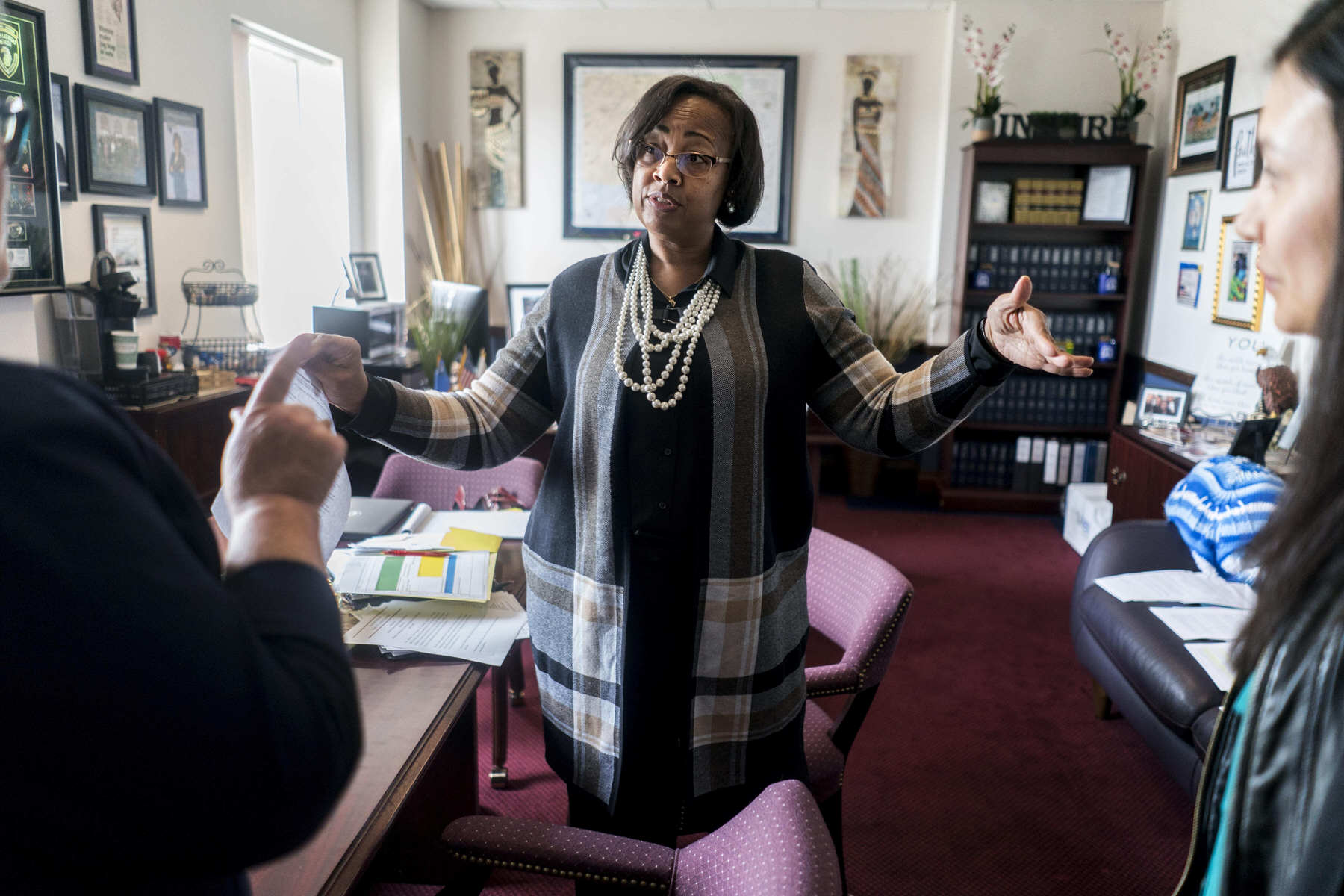 Nevada State Representative Danielle Monroe-Moreno speaks to education advocates in her office.