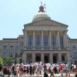 Abortion rights advocates rally in front of the Georgia State Capitol.