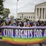 Protesters block the street in front of the Supreme Court.