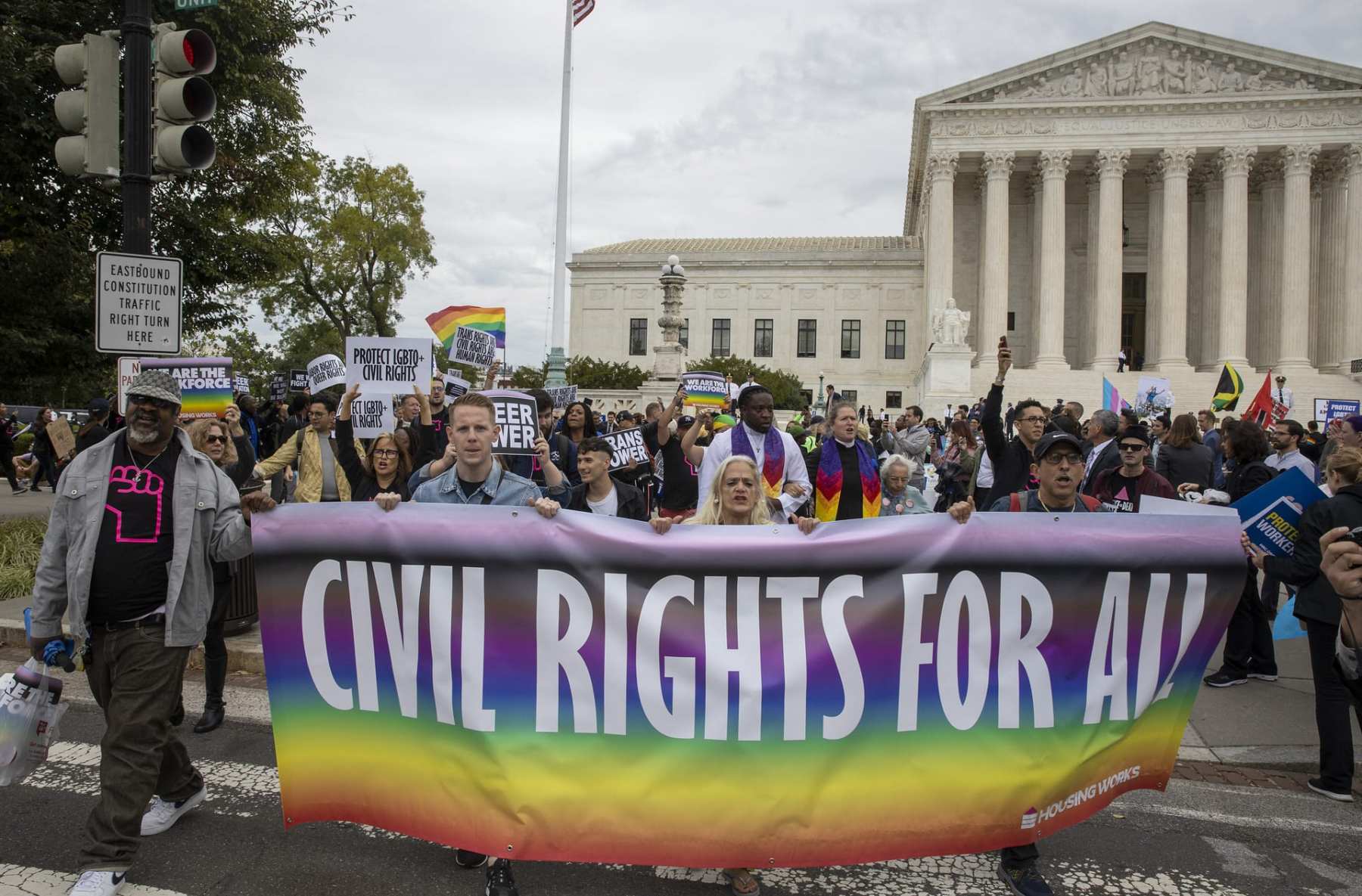 Protesters block the street in front of the Supreme Court.