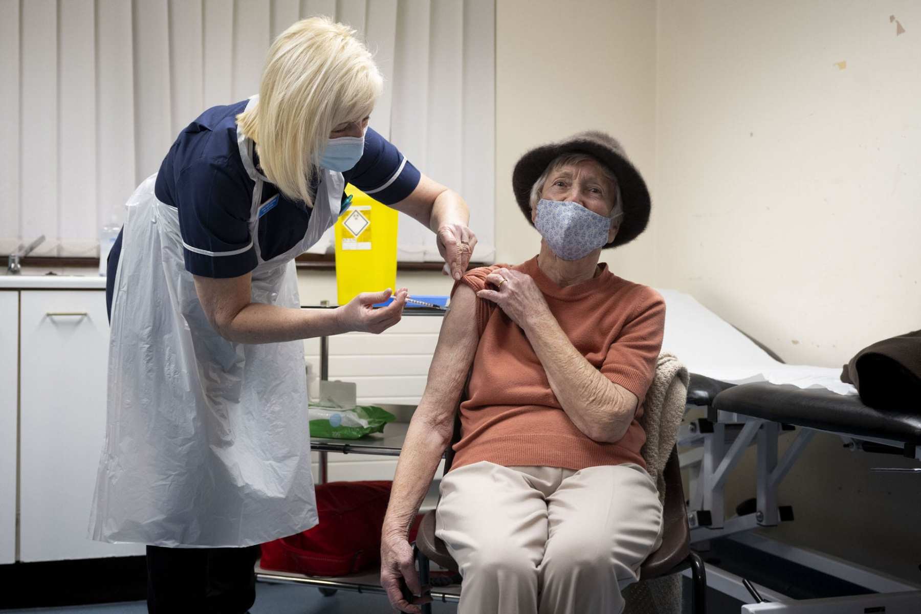 A woman receives the Oxford-AstraZeneca Covid-19 vaccine.