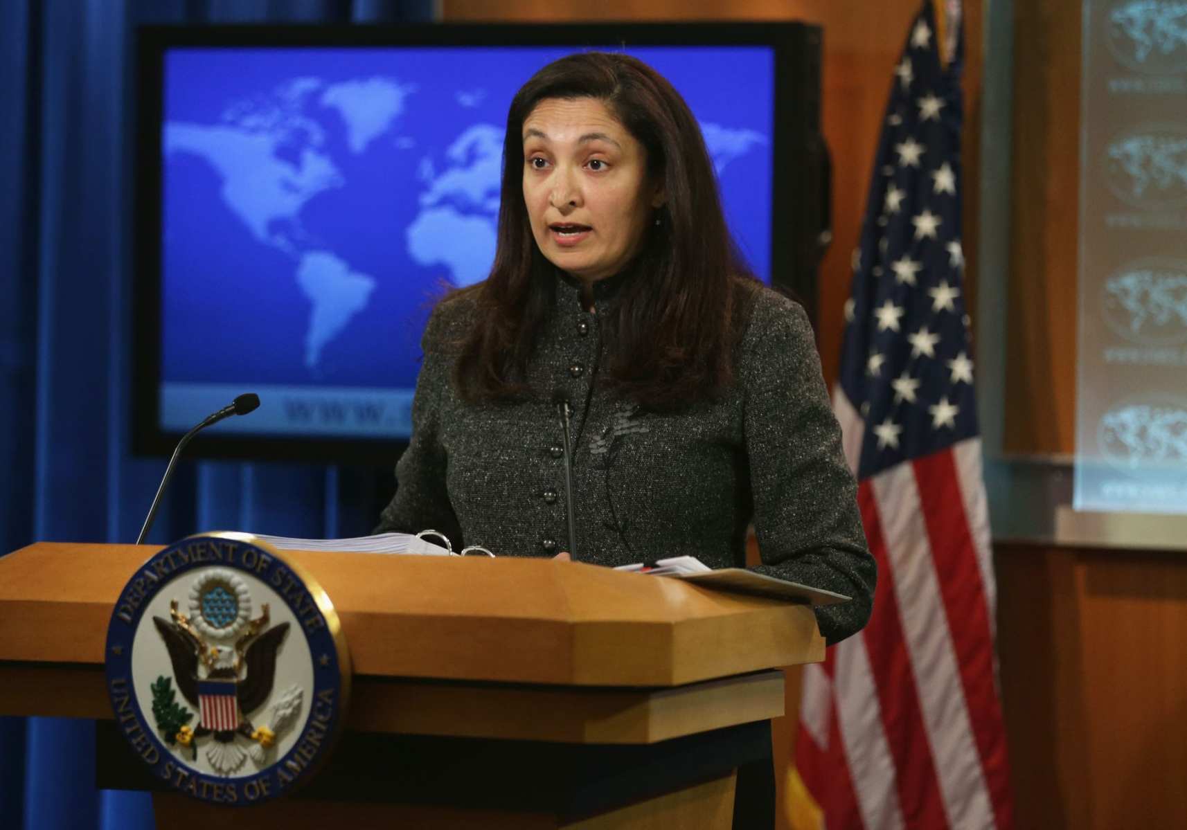 Acting Assistant U.S. Secretary of State for Bureau of Democracy, Human Rights and Labor Uzra Zeya speaks at a podium.