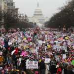 WASHINGTON, DC - JANUARY 21: Protesters walk during the WomenÕs March on Washington, with the U.S. Capitol in the background, on January 21, 2017 in Washington, DC. Large crowds are attending the anti-Trump rally a day after U.S. President Donald Trump was sworn in as the 45th U.S. president. (Photo by Mario Tama/Getty Images)