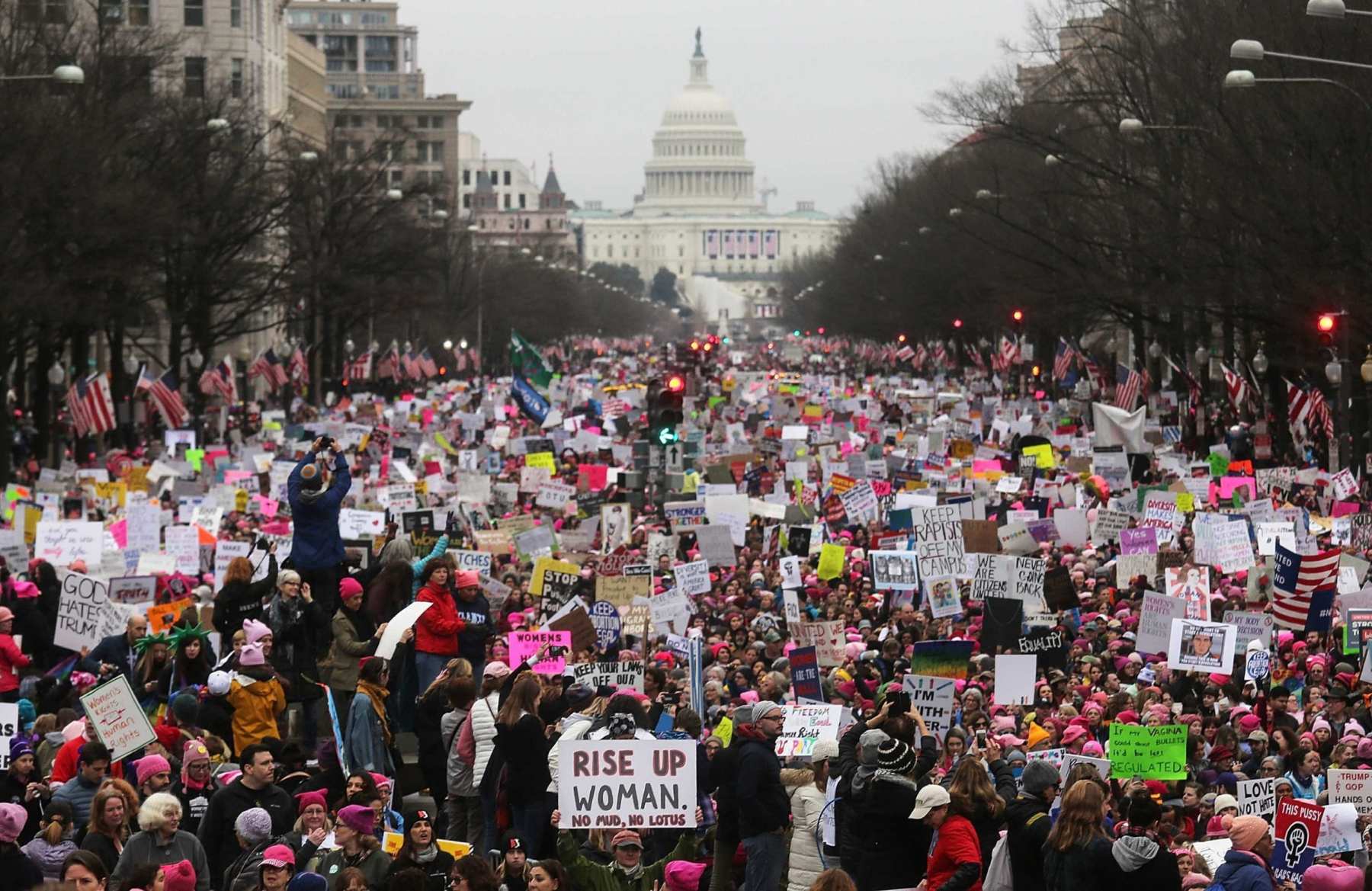 WASHINGTON, DC - JANUARY 21: Protesters walk during the WomenÕs March on Washington, with the U.S. Capitol in the background, on January 21, 2017 in Washington, DC. Large crowds are attending the anti-Trump rally a day after U.S. President Donald Trump was sworn in as the 45th U.S. president. (Photo by Mario Tama/Getty Images)