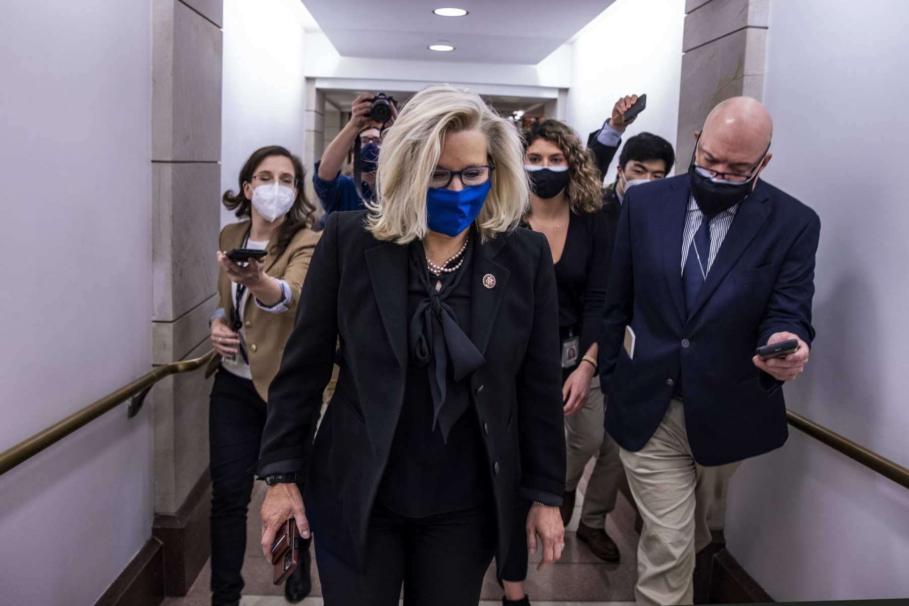 Liz Cheney walks to the House floor to vote on Feb. 3, 2021.