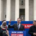 U.S. Sen. Chris Murphy (D-CT) speaks to gun safety advocates as they rally in front of the U.S. Supreme Court.