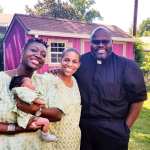 Rev. Ray McKinnon with Tonetta and her family.