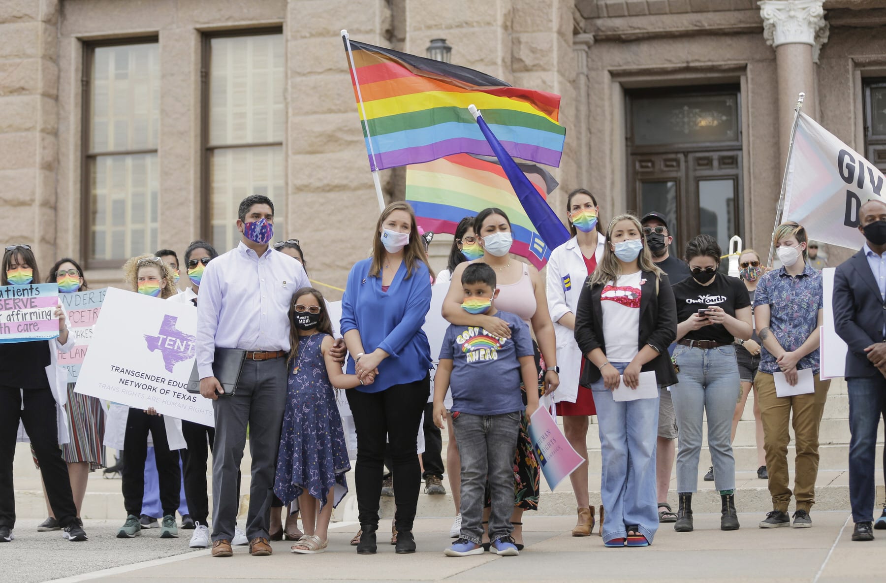 LGBTQ advocates demonstrate in front of the Texas State Capitol.