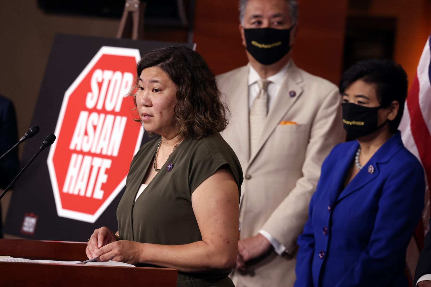 Rep. Grace Meng (L) (D-NY) joined by Rep. Mark Takano (C) (D-CA) and Rep. Judy Chu (D-CA) speaks on the COVID-19 Hate Crimes Act at the U.S. Capitol.