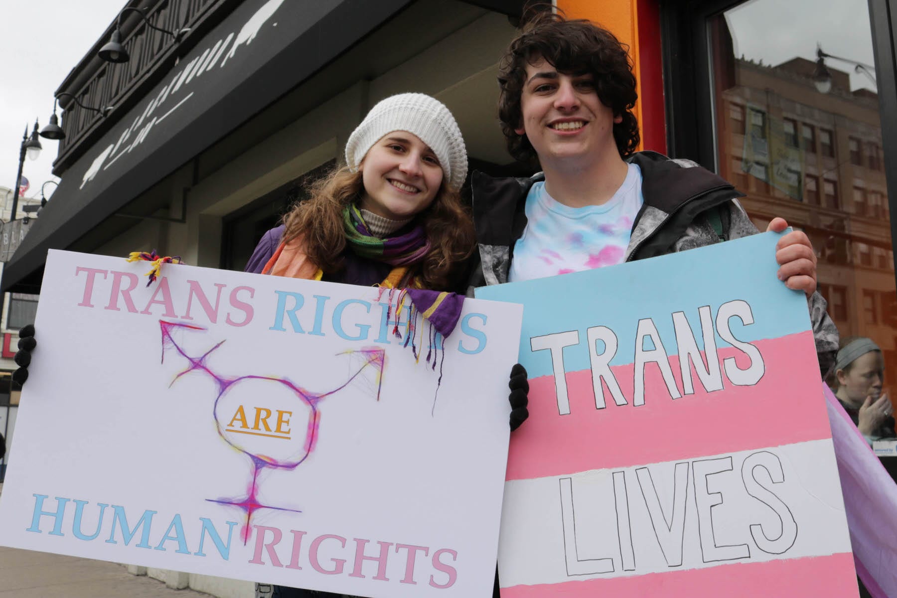 Transgender student Sorrel Rosin (R) poses with a friend February 25 2017 in Chicago as hundreds of transgender supporters protest against the Trump administration's reversal of federal protections