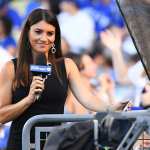 Reporter Alanna Rizzo stands with a microphone in her hand.