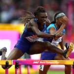 Dawn Harper-Nelson jumping over a hurdle.