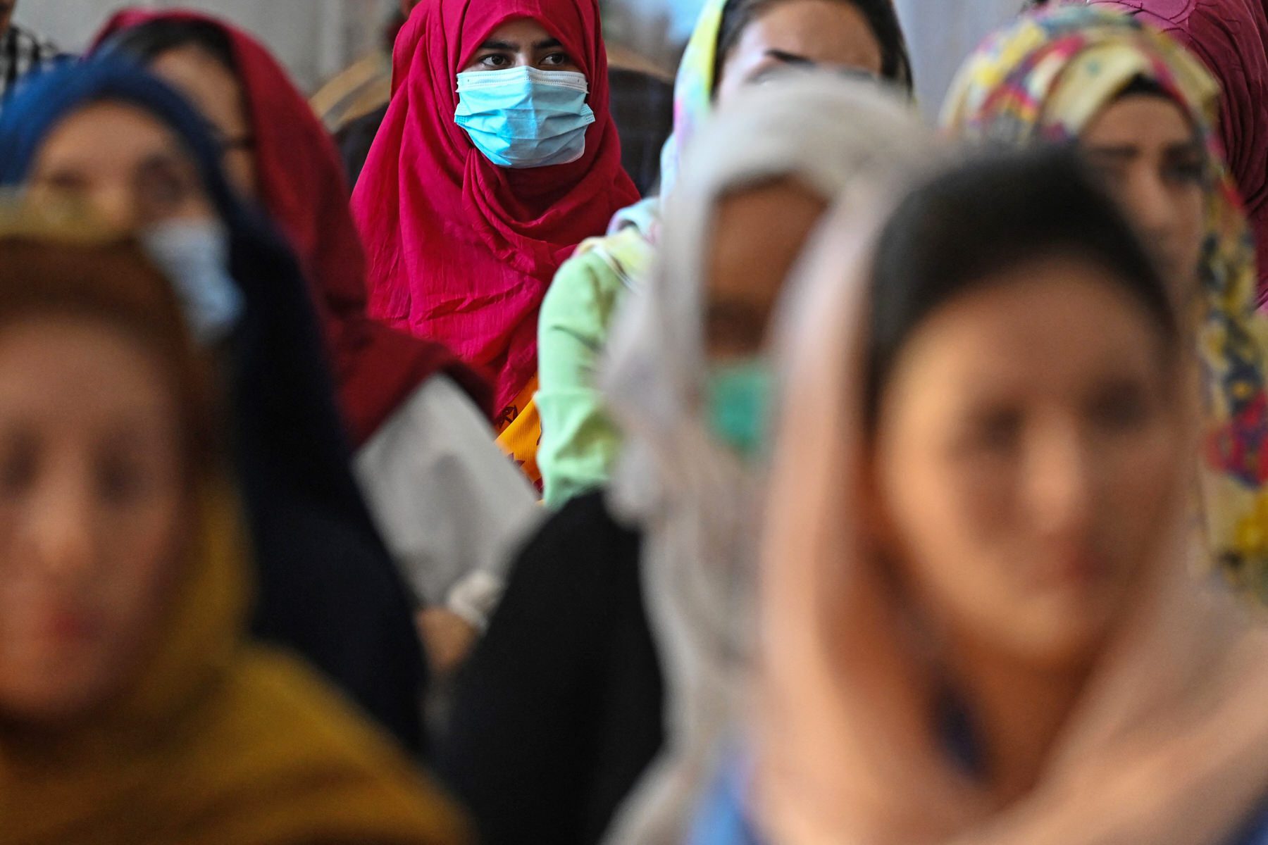 Afghan women take part in a gathering at a hall in Kabul.