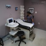 Marva Sadler, director of clinical services at Whole Woman's Health in Fort Worth, prepares an operating room at the abortion clinic.