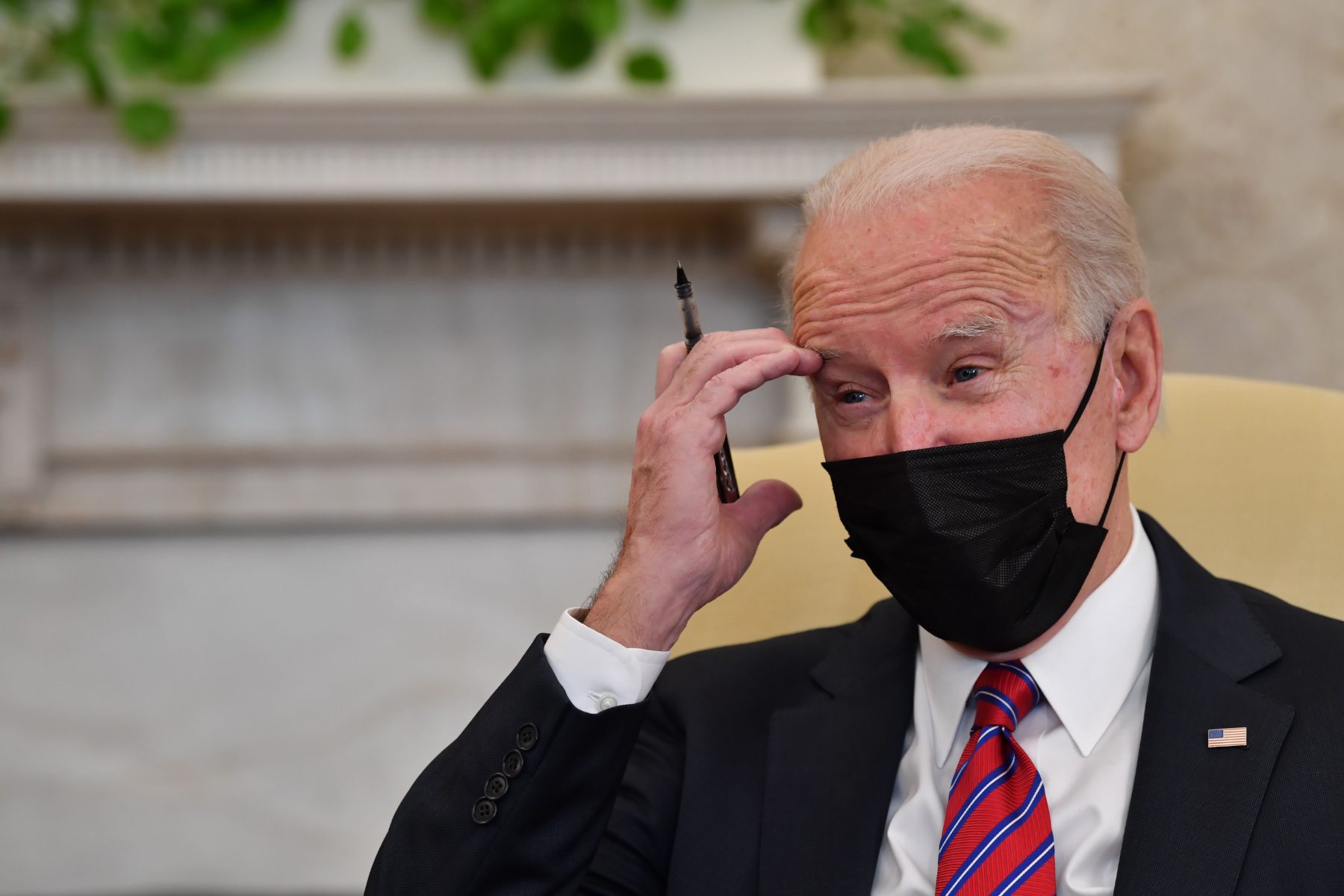 US President Joe Biden speaks in the Oval Office.