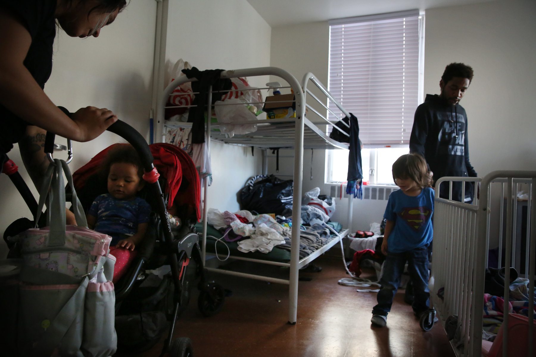 Photo of children and parents in a shelter.