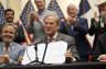 Texas Gov. Greg Abbott signs a bill