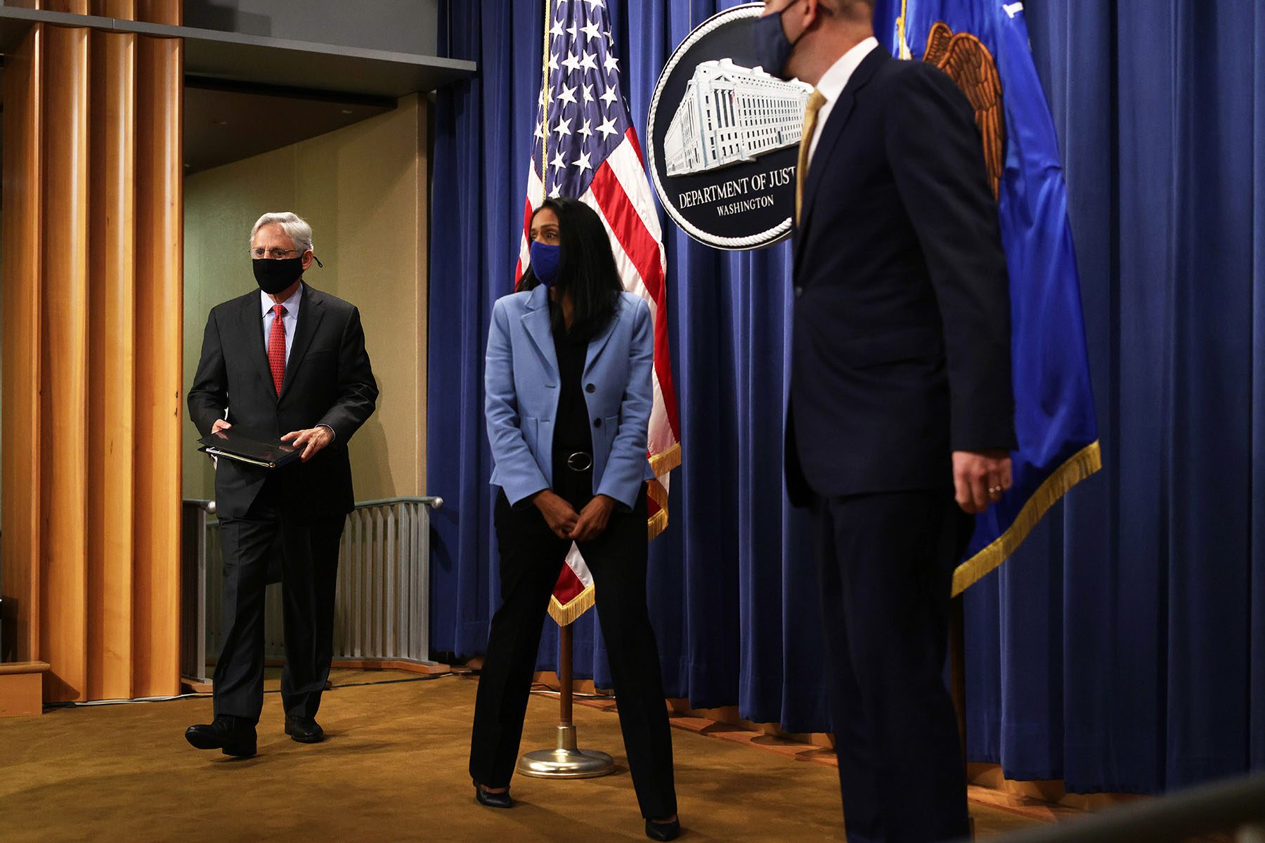 U.S. Attorney General Merrick Garland arrives at a news conference to announce a civil enforcement action at the Department of Justice.