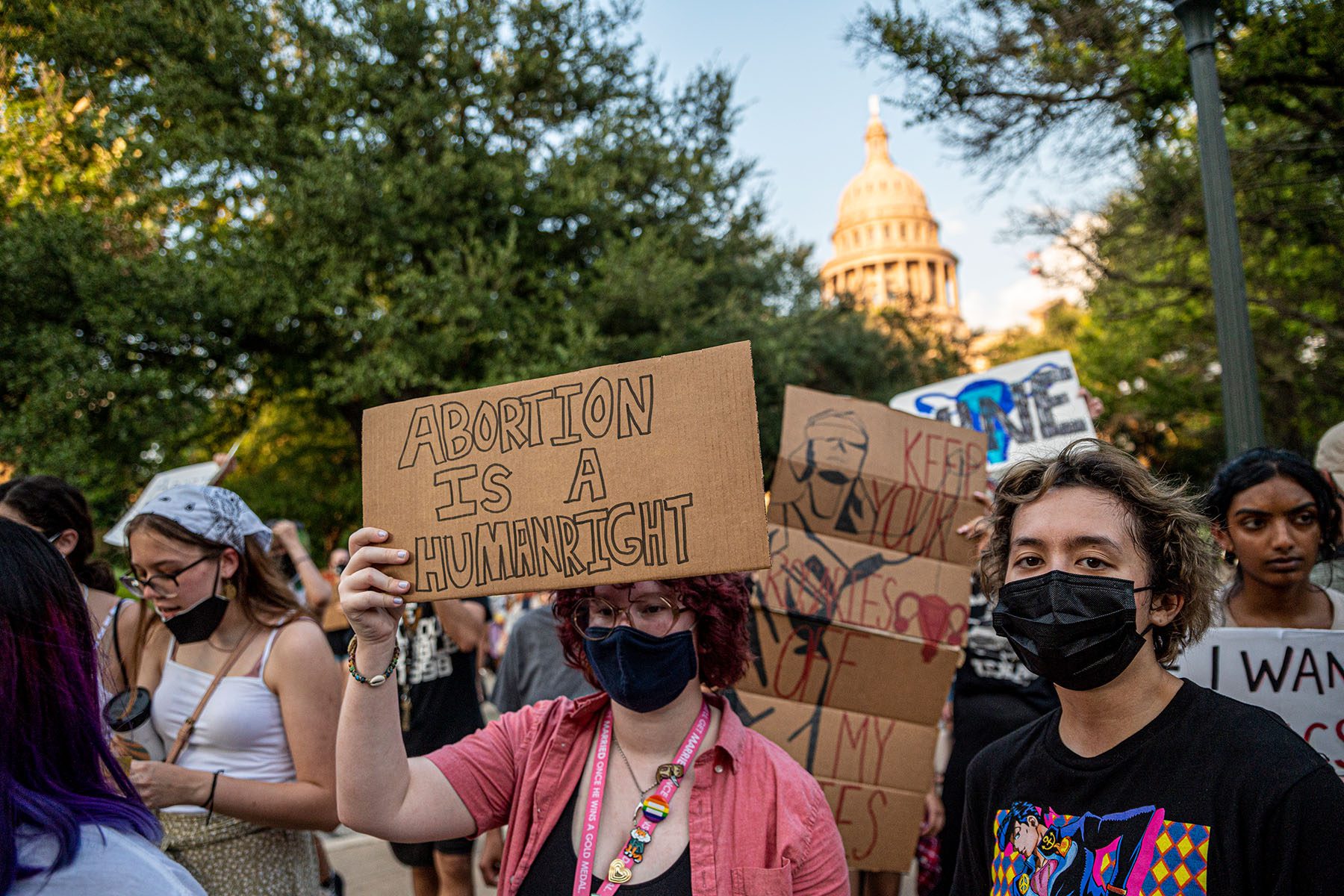 Abortion activists march outside the Texas State Capitol.