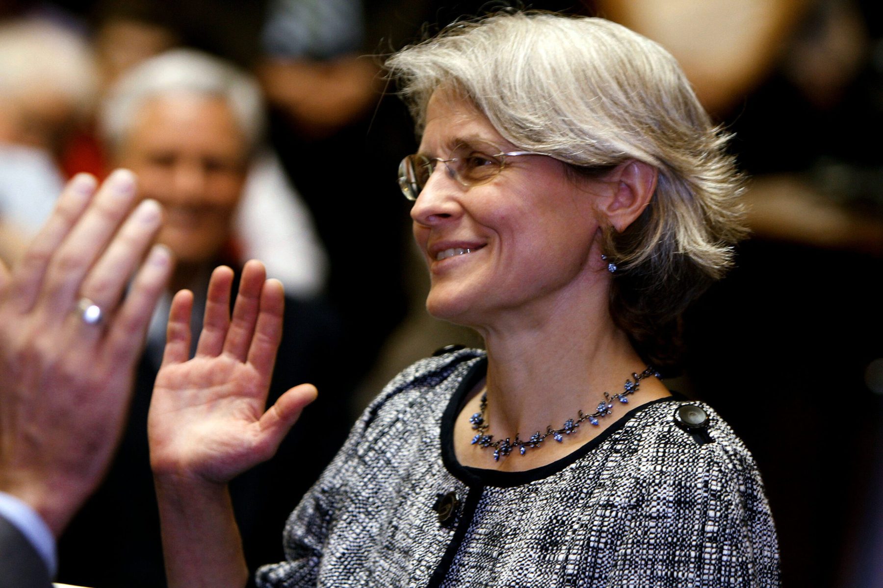 Beth Robinson raises her hand to take the oath of office.