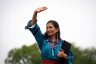 Secretary of the Interior Deb Haaland waves to the crowd.