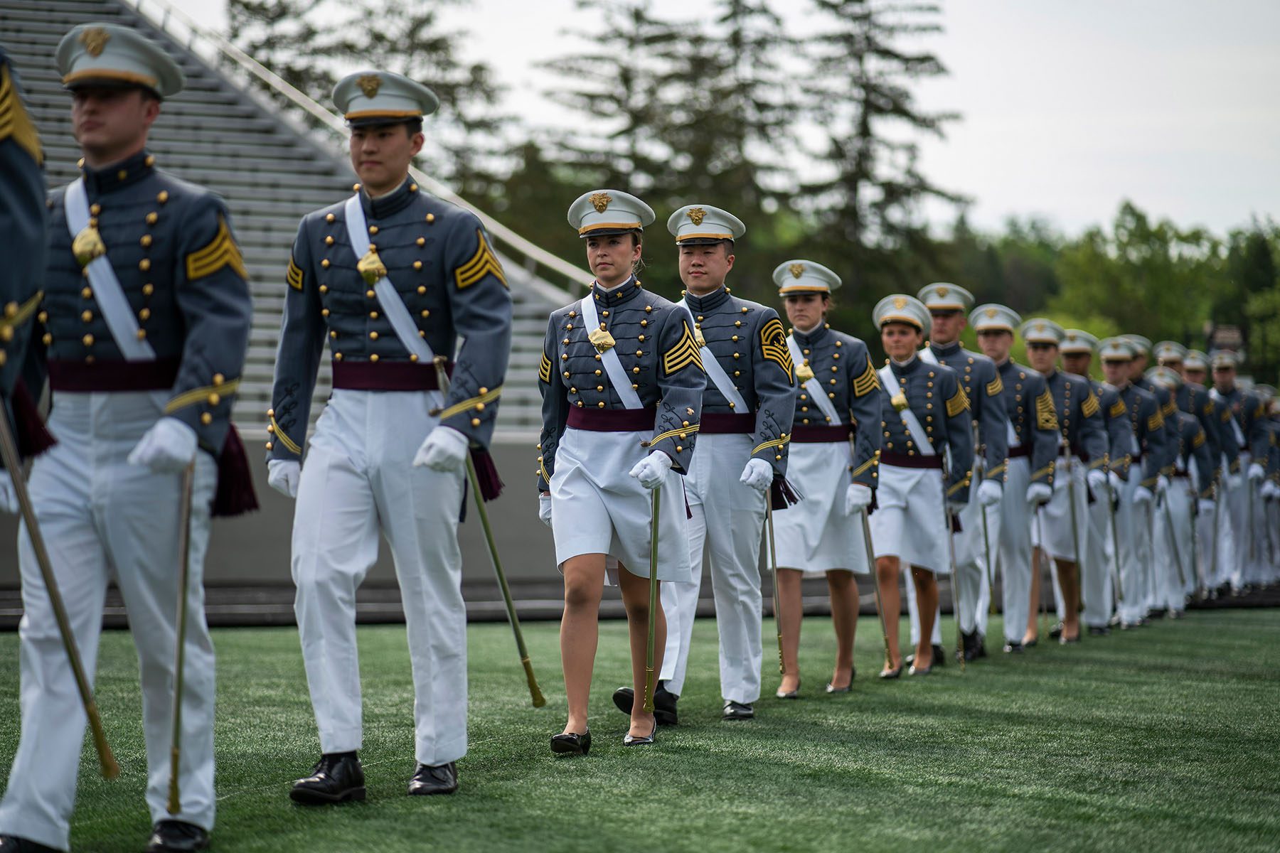 graduating cadets march to their graduation.