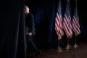 President Biden walks off stage after delivering remarks to the press.