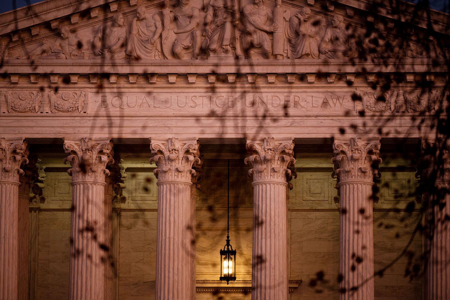 Sunset light illuminates the U.S. Supreme Court building.