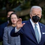 President Biden waves as he walks to Marine One on the South Lawn of the White House.