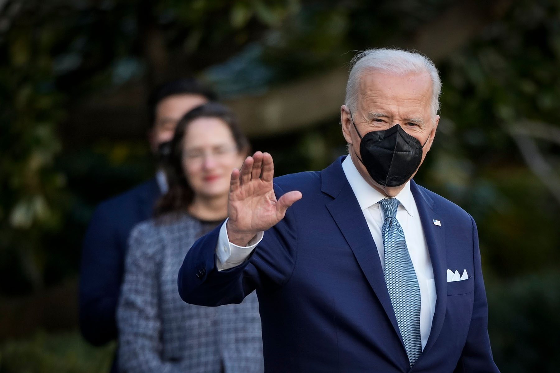 President Biden waves as he walks to Marine One on the South Lawn of the White House.