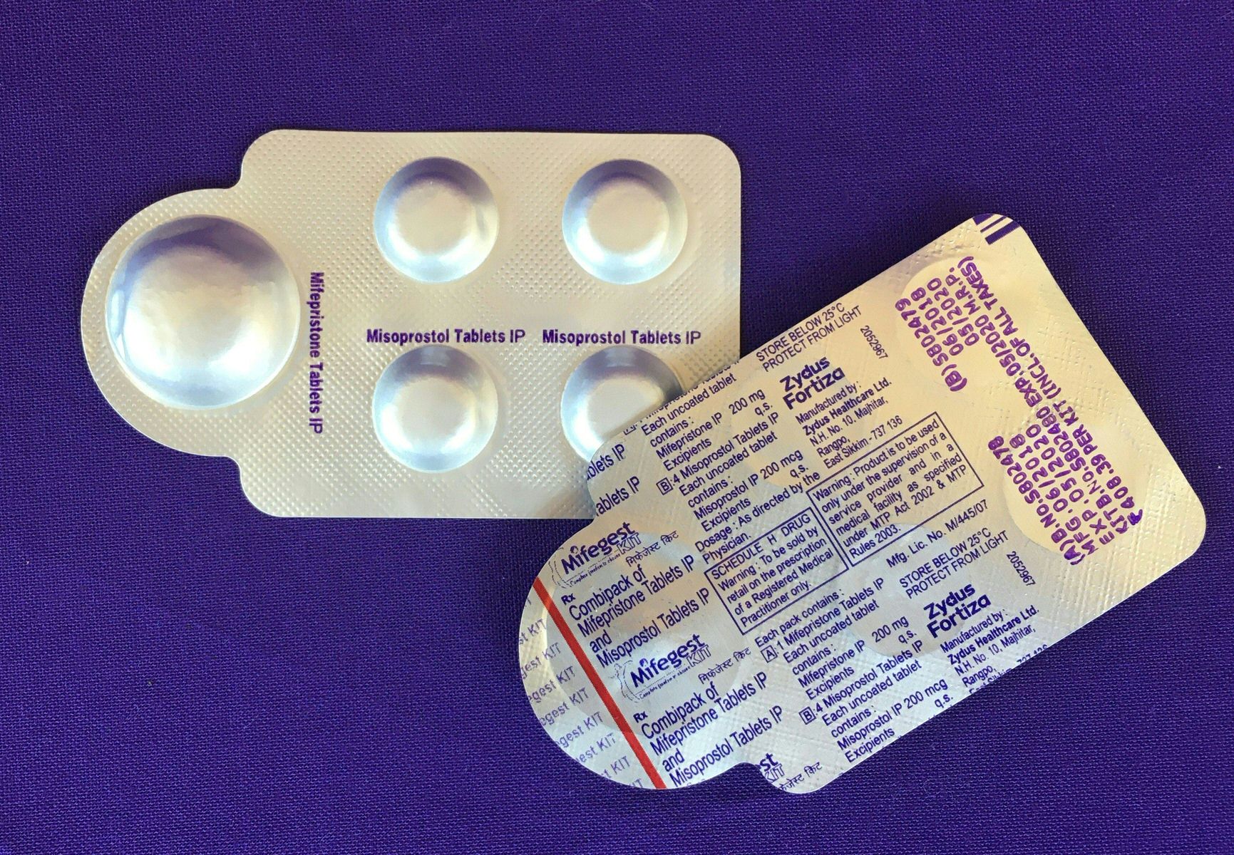 two packets of abortion medication pills