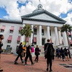 Abortion rights advocates march to the Florida Capitol.