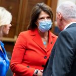 Gretchen Carlson, Cheri Bustos and Ken Buck speak amongst each other on Capitol Hill.