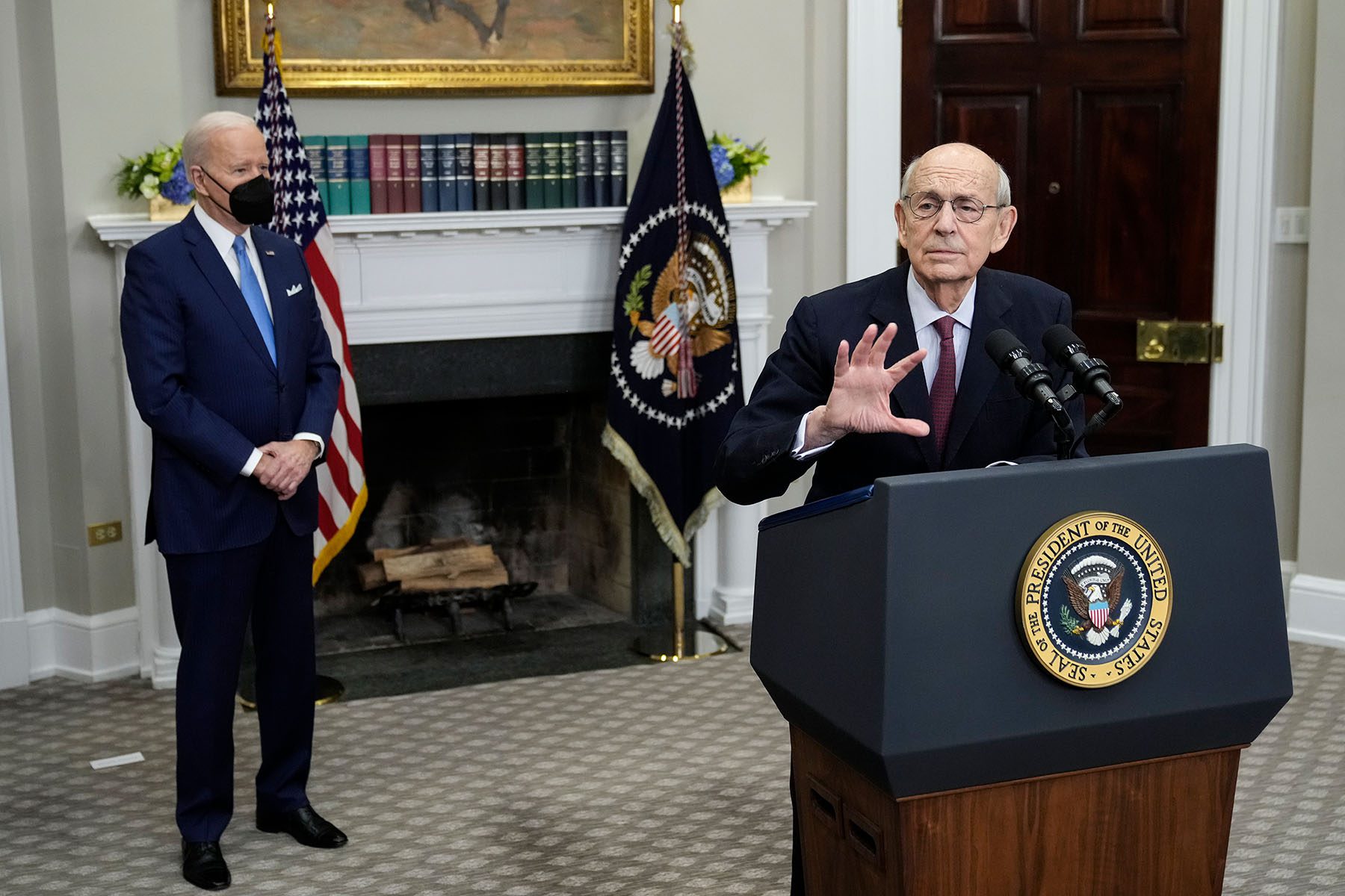 Biden looks on as U.S. Supreme Court Associate Justice Stephen Breyer speaks about his coming retirement.