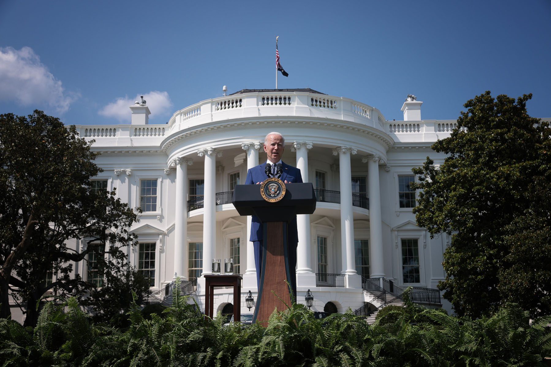 Joe Biden delivers remarks in front of the White House.