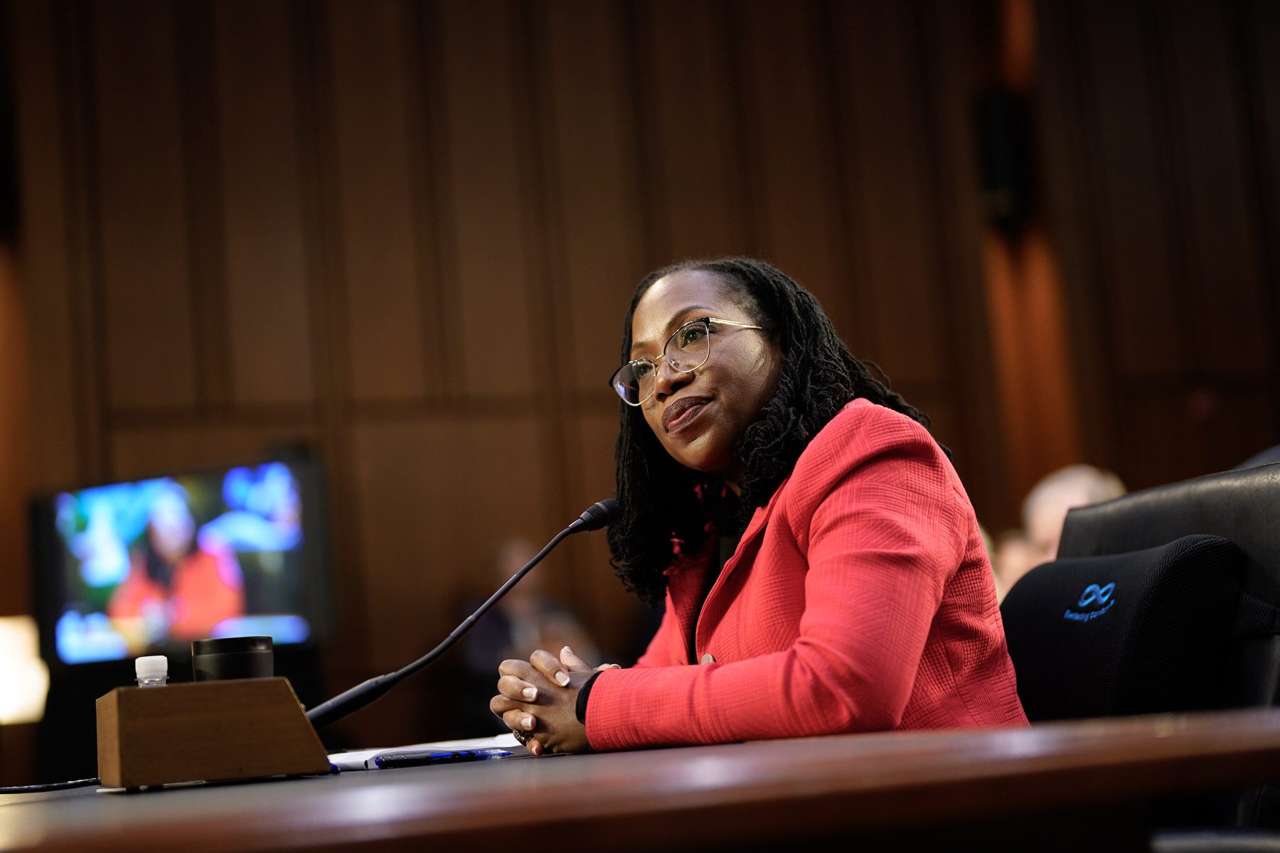 Ketanji Brown Jackson sits at a table in the Senate Judiciary hearing