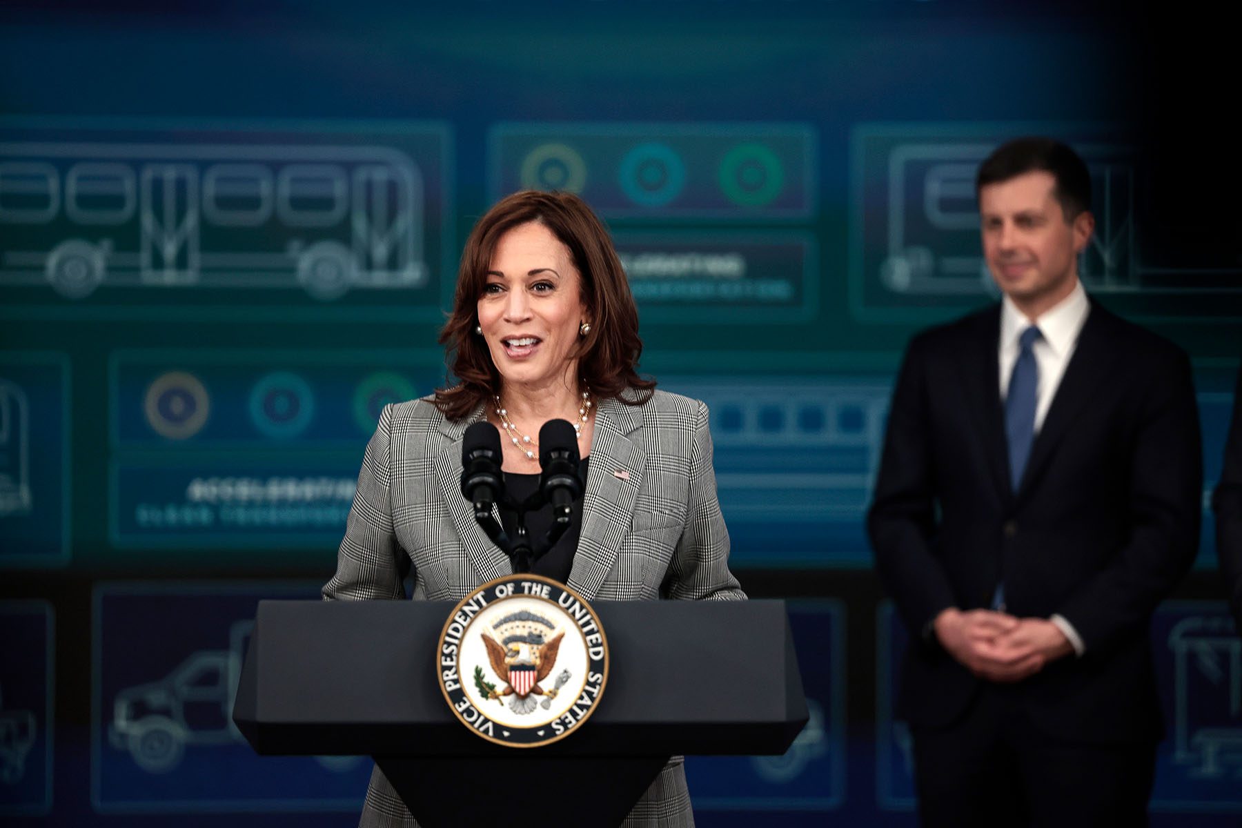 Vice President Kamala Harris speaks at a podium.