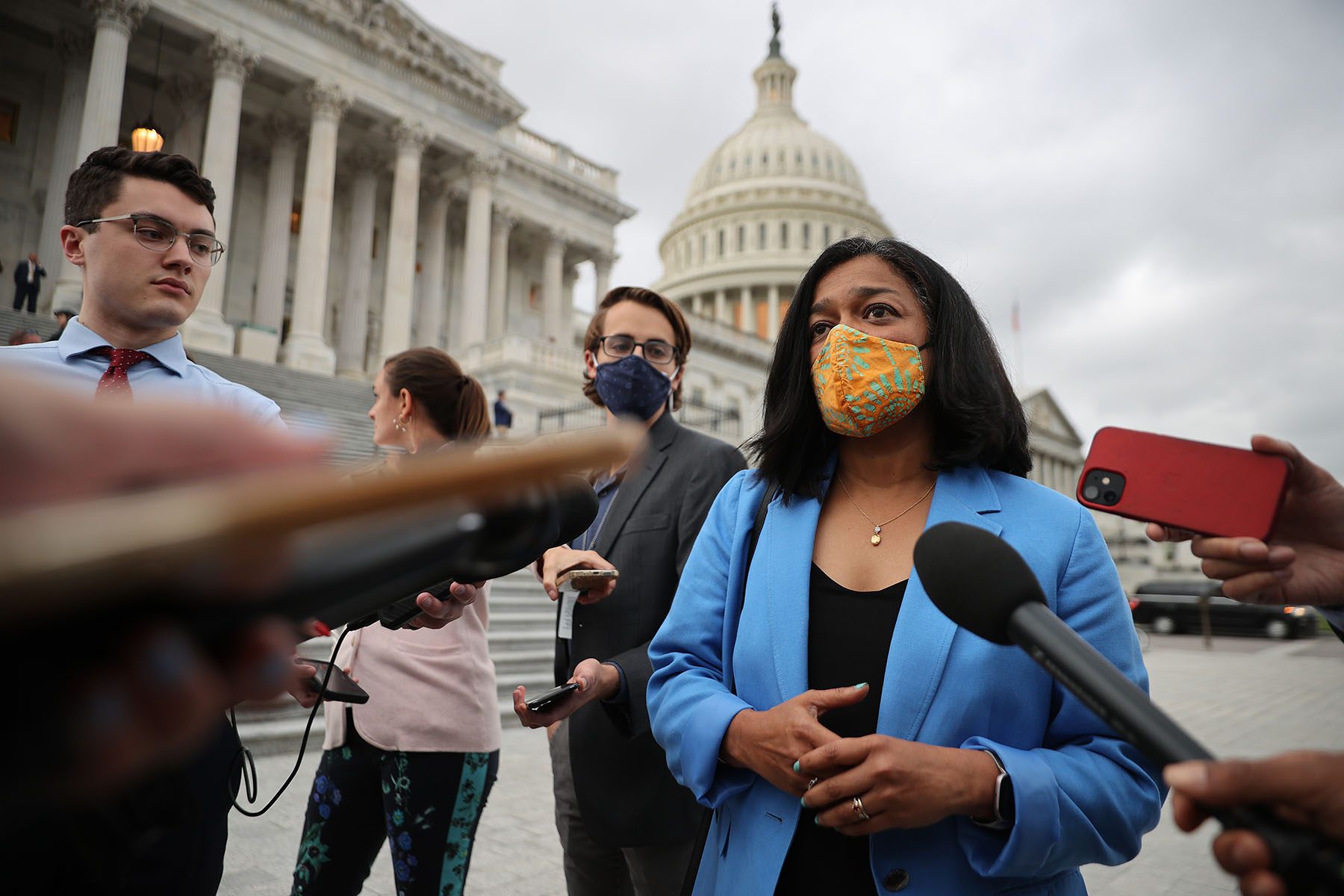 Rep. Pramila Jayapal speaks with reporters outside the U.S. Capitol.