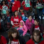 McDonald's employees rally during nationwide protests demanding living wages.